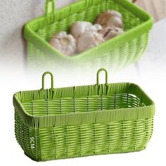 two green baskets with handles on each side and mushrooms in the other basket behind them