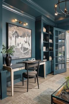 french doors, paned doors, blue-green home office, built-in shelving, built-ins home office, wicker decor, indoor trees, house plants