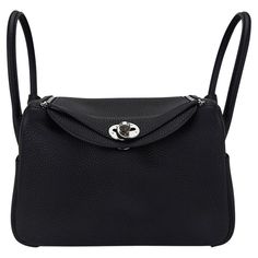 Mightychic offers an Hermes Lindy 26 bag featured in Black. Plush Clemence leather. Crisp with Palladium hardware. Functional as a top handle bag or a hands free shoulder bag. Exterior pocket on each side and surprisingly spacious interior. Top has two zippers for easy closure. The Clemence leather is soft and pliable, adding so much to the styling of the bag. Comes with signature Hermes box and sleeper. NEW or NEVER WORN. final sale BAG MEASURES: LENGTH 26 cm / 10.25" TALL 17.25 cm / 6.25" DEEP 13 cm / 5" CONDITION: NEW or NEVER WORN Hermes Lindy 26, Lindy 26, Mini Lindy, Hermes Lindy, Winter Bags, Hermes Box, Handle Bag, Hands Free, Fashion Handbags