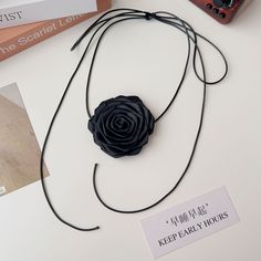 Material: Cloth Fashion Element: Flowers Style: null Elegant Flower Necklace For Beach, Elegant Black Necklace For The Beach, Elegant Black Necklace For Beach, Handmade Black Flower Necklace, Handmade Adjustable Flower Necklace, Elegant Black Necklaces For Spring, Black Bohemian Flower Necklace, Bohemian Black Flower Necklace, Black Flower Choker For Gifts