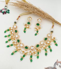 Make a bold and elegant statement with our USA Bride Tyaani Inspired Green Beads Stone Uncut Moissanite Polki Necklace Set, a stunning blend of luxury and tradition. Inspired by the timeless beauty of Tyaani jewelry, this necklace set is meticulously handcrafted to capture the essence of royal Indian craftsmanship, making it a perfect fit for modern brides who want to embrace heritage with a contemporary flair. At the heart of this exquisite piece are the uncut Moissanite Polki stones, known for Traditional Bridal Jewelry, Polki Necklace Set, Modern Gown, Royal Indian, Wedding Ceremony Traditions, Polki Necklace, Green Beads, Wedding Jewellery Necklace, Bridal Set