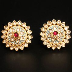 "Kundan Studs,Polki Emerald Studs earrings,Kundan Jhumka,Kundan Earrings,Kundan Jadau Stud Earrings,Kundan Jewelry,Kundan traditional earring These earrings are handcrafted with love and creativity and are perfect for any occasion. These handcrafted beautiful high quality earrings are made in Brass alloy in tribal handcrafted designs with matte gold finish paired with exclusive handwork. Pair them up with Indian traditional outfit such as Anarkalis, Lehengas or Sarees and be the \"Diva\" at your Kundan Meenakari Earrings In Temple Jewelry Style, Round Meenakari Earrings For Puja, Meenakari Earrings For Puja, Round Shape, Meenakari Round Earrings For Puja, Traditional Chandbali Earrings With Zari Work, Meenakari Earrings For Puja, Traditional Zari Work Earrings For Diwali, Bollywood Multicolor Zari Work Earrings, Kundan Bridal Earrings With Cutdana For Puja