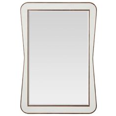 a white and brown framed mirror