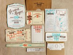 an assortment of wedding stationery and paper goods