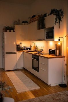 the kitchen is clean and ready for us to use in the night time, with no one around it