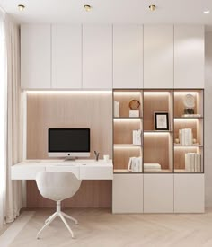 a white desk with a computer on top of it in front of a bookcase