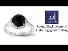 a black diamond halo engagement ring with diamonds on the sides and an inscription that reads round black diamond halo engagement ring