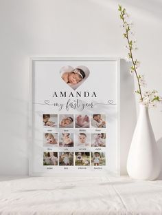 a white vase sitting next to a wall with a baby's first year photo on it