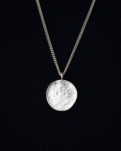 "A perfect layering necklace with hammered medallion pendant! Sterling silver medallion has hammer marks on the front and also on the side all around the disc The flat curb chain is perfect for the length of the necklace and also makes it durable The pendant measures 5/8\" in diameter and 1/16\" thick The chain is 1.3mm flat curb chain 22\" long (Let us know if you want different length) This necklace is ready for shipping 👌🏻 All items are handmade with love and care in my little studio! If yo Sterling Silver Medallion Coin Necklace With Oxidized Finish, Sterling Silver Oxidized Medallion Coin Necklace, Sterling Silver White Gold Medallion Necklace With Coin Pendant, Hammered Sterling Silver Coin Necklace, White Gold Sterling Silver Coin Pendant Medallion Necklace, Hammered Round Sterling Silver Coin Necklace, Round Sterling Silver Hammered Coin Necklace, Sterling Silver Round Coin Necklace With Large Pendant, Hammered Silver Coin Necklace In Sterling Silver