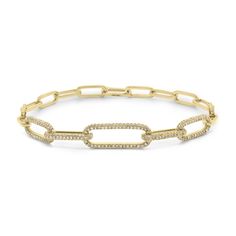 Trendy and glamorous, this diamond-encrusted paperclip chain bracelet makes for the perfect stacking style. It will effortlessly elevate any look. - 14K gold weighing 6.79 grams - 290 round diamonds totaling 0.73 carats Available in yellow, white, and rose gold. Please allow 4-6 weeks for delivery if item is not in stock. Item no. BR0089K Gold Bracelets Stacked, Diamond Chain Necklace, Open Heart Necklace, Oval Locket, Clover Necklace, Diamond Chain, Teardrop Necklace, Girls Necklaces, Diamond Fashion