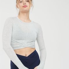 Super Soft, Light Weight, And Stretchy Fabric In Medium Heather Gray. Fitted And The Twisted Front Is Super Cute. Gray Casual Yoga Top, Casual Gray Top For Light Exercise, Gray Casual Top For Light Exercise, Cozy Tops, Cropped T Shirt, Soft Tops, Soft Shorts, Mens Outfitters, High Quality T Shirts