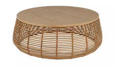 a round wicker coffee table with wooden top