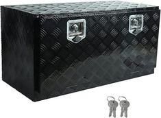 a large black box with two keys attached to the front and side panels on both sides