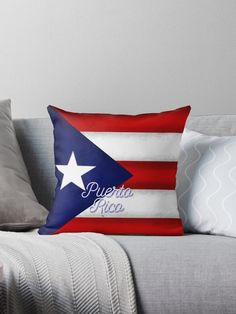 the puerto rican flag on a couch with pillows