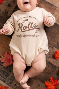 "This baby thanksgiving outfit will get lots of laughs!  Funny graphic is original to this shop :) Listing includes \"These rolls are homemade\" on your choice of piece: -  on natural bodysuit (short or long sleeve).   - sweatshirt romper - tshirt - oatmeal long romper  Sizes  See size chart in listing photos.   Printing  Most of the bodysuits are screenprinted.  The sweatshirt rompers, long rompers are all heatpressed with screenprint transfers.  Tees are screenprinted. ** Timing ** Super fast These Rolls Are Homemade Baby Picture, Homemade Rolls Onesie, Baby Onesies Cricut, Thanksgiving Onesie Ideas, Baby Boy Things, Newborn Outfits Boy, Thanksgiving Baby Shirts Vinyl, Baby Thanksgiving Outfit