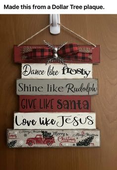 a wooden sign hanging on the side of a door that says dance like frosty shine like rudolph give like santa love like jesus