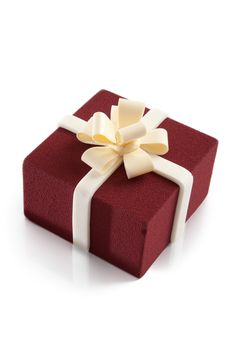 a red gift box with white ribbon and bow