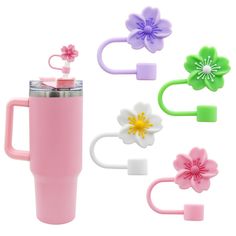 a pink coffee cup with four flower clips attached to the handle and two cups on each side