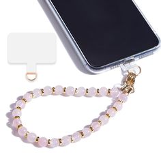 PRICES MAY VARY. Unique Design: Our phone wrist strap is crafted from pure natural stone beads, meticulously strung with durable thread and accented with 14K real gold electroplated metal between gemstones.Phone strap wrist ensures your phone stays secure yet easily accessible—a perfect solution for those needing quick phone access while keeping hands free. Multi-Functional: The wristlet for phone includes a versatile tether tab compatible with 90% of phone cases. Whether you're out clubbing, at Iphone Bracelet, Phone Wristlet, All Mobile Phones, Slim Wallet, Hands Free, Wrist Strap, Acrylic Beads, Bead Designs, San Valentino