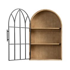 an open book shelf next to a metal arch