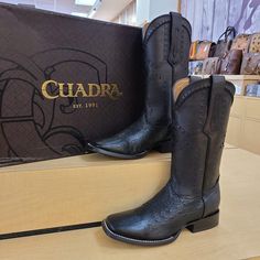 Cuadra always lives up to it expectations. From round toe to square toe, this handmade smooth ostrich boot is meticulously hand-crafted with finesse. Hand-constructed with the finest leathers, It features a soft and supple leather lining, smooth and rich ostrich profile in oryx and black, hand-lasted stitched siding and supple calfskin upper and side. MADE IN MEXICO Brand: Cuadra For: Men (view size chart) Details: Sku: 3Z01AB Stk: CU470 Color: Black Square Toe - Genuine Ostrich Belly Leather - Full-Quill Ostrich Counter - Stacked leather heel with reinforced rubber for grip - Width | EE - Goodyear Welt Construction - Leather insole for best break in period. Care: Avoid exposing to sharp objects to prevent leather damage. Maintenance: Wipe with a soft and slightly damp cloth (with clean wa Ostrich Boots, Black Cowboy Boots, Western Style Boots, Mens Cowboy, Square Toe Boots, Chelsea Boots Men, Stylish Boots, Cowboy Western, Mens Shoes Boots