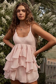 Tiered ruffles make this mini slip from Intimately the perfect romantic addition to your wardrobe. **Fit:** A-line, empire waistline, mini length **Features:** Babydoll style, tiered ruffles, scoop neckline, skinny straps with adjustable tie back **Why We | Runaway Rockstar Mini Slip by Intimately at Free People in Pink, Size: XS Nightie Dress, Flowy Mini Dress, Empire Waistline, Babydoll Style, Mini Slip, Summer Clothes, Tie Back, Boho Outfits, Scoop Neckline