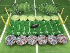 a cake made to look like a football field with sprinkles on it