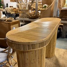 a bamboo table and chairs in a store