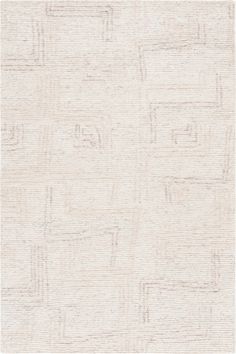 a white rug with squares and lines on it