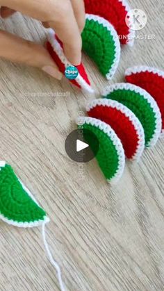 crocheted christmas tree ornaments being sewn together