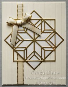 a close up of a card with a bow on it