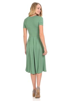 The ease, versatility and simple beauty of this midi dress will make it your favorite new canvas for all kinds of accessories. Mix and match your favorite shoes, scarves, hats and Iconic Luxe’s jewelry for a fresh look every time you slip it on. This delightful dress features banded round neckline, concealed side pockets, deep pleats all around the waist, midi length and full swing skirt. It is made of soft jersey knit that has great stretch. 95% Rayon 5% Spandex Made in USA Model is wearing siz Midi Dress With Pockets, Flutter Dress, Wedding Dresses Satin, Dress Stores Online, Pleated Midi Dress, Pocket Dress, Dress With Pockets, Knee Length Dress, Top Rated