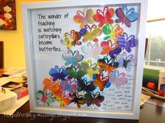 an art project with butterflies on it and the words, the wonder of teaching is watching everyone become butterflies