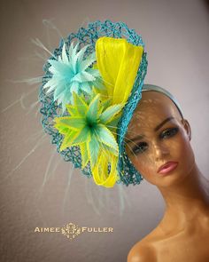 Structured, chic crisscross woven material on this asymmetrical showpiece. Silk ribbon feature and hand-cut fancy feather-bursts. --This style featured on Hatista Dress to Impress (UK)-please see photo gallery-- Easy-to-wear headband fascinator makes a statement, and can be worn to a myriad of events: Easter, Bridal, Derby-Wear, Del Mar Races, Hat Contests, Church, Gala, Kentucky Derby, Melbourne Cup, High Tea, Weddings, Cocktail Parties, Weddings, and More.  Some customization available; please message with your requests to see if we can meet your needs. Other colors available; please inquire before purchase if you need another.  *FREE SHIPPING  For more STATEMENT JEWELRY and HANDMADE HATS go to www.aimeesfuller.com Aimee Fuller has been a trusted online seller since 1999, and is excited Kentucky Derby Outfit, Cup Hat, Oaks Day, Headband Fascinator, Kentucky Derby Fascinator, Blue Fascinator, Royal Ascot Hats, Derby Outfits, Derby Fascinator