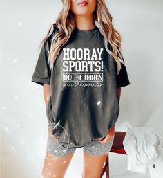 Hooray Sports Shirt AT CHECKOUT: ▪️ Shirt Color(Shown in Pepper) ▪️ Size ▪️ Design Color SHIRT INFO: ▪️ Comfort Color heavy blend shirts ▪️ All shirts are unisex fit. Please refer to the size chart provided in the listing photos for more details. ▪️ For oversized look please size UP 1-2 sizes ▪️ Unisex, 6.1 oz, 100% ring spun cotton, garment-dyed, DESIGN INFO: ▪️ Design is heat transfer vinyl and is applied to each shirt with a commercial grade heat press. ▪️ There may at times be a slight diffe Go Sports Shirt, Sporty Tops For Game Day, Sports Fan Tops For Sports Season Events, Sporty Athletic Heather T-shirt For Game Day, Sporty T-shirt In Athletic Heather For Game Day, Moisture-wicking Shirt For Sports Events And Seasons, Moisture-wicking Shirt For Sports Events, Athleisure Sports Top With Team Name, Collegiate Moisture-wicking Gym Tops