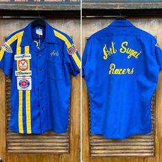 "Vintage 1960's Hot Rod Drag Race Indy 500 Pit Crew Racing Car Club Embroidery Bowling Shirt. Tag Size 16. Please check the measurements below.  Very good condition.  The label is  \"Hinchman\".  Original 1960's.  Pit crew work shirt with hot rod patches and chainstitch embroidery.   All Sales Final.   Please ask any questions before purchase.   Take a look at our Store for more Vintage Clothing - VintageOnHollywood.   MEASUREMENTS  Shoulder to Shoulder: 19 1/4\" Underarm to Underarm: 23\" Outer Nascar Pit Crew Costume, Pit Crew Shirts, Vintage Bowling Shirts, Vintage Bowling, Racing Club, Pit Crew, Car Shirts, Shirt Tag, Bowling Shirt