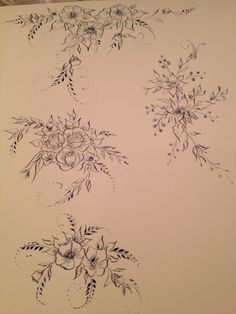 some flowers are drawn on a sheet of paper