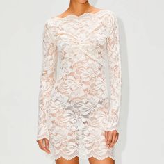 My Daughter Wore This Dress One Time For A Sorority Gathering Together. Perfect Condition. This Beautiful White Lace Dress Is Perfect For Any Special Occasion. The Dress Is The Same In The Picture But We Bought The One With Beige Liner From Revolve. It Features A Square Neck, Long Sleeves, And A Fitted Silhouette. The Delicate Floral Lace Overlay Adds A Touch Of Femininity, While The Stretchy Lining Ensures A Comfortable Fit. This Dress Is Sure To Make You Look And Feel Your Best. Summer Long Sleeve Lace Dress With Scalloped Lace, Summer Lace Dress With Scalloped Lace And Long Sleeves, Summer Scalloped Lace Long Sleeve Dress, Long Sleeve Dress With Scalloped Lace For Daywear, Elegant Mini Dress With Scalloped Lace For Daywear, Elegant Scallop Lace Mini Dress For Daywear, Fitted Long Sleeve Lace Dress For Daywear, Sheer Lace Dress For Spring, White Long Sleeve Sheer Lace Dress