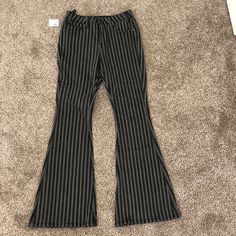 Never Been Worn (New With Tags) Striped Black And Grey Bell Bottom Jeans! They Are A Size 26 X 32. They Are Super Stretchy And Have Plenty Of Give! They’re Super Comfortable To Wear! Extremely Trendy Jeans;) Fitted Denim Rock Bottoms, Rock Style Fitted Denim Bottoms, Fitted Rock Style Denim Bottoms, High Rise Grunge Flare Jeans For Fall, Fall Grunge Flare Jeans, Casual Striped Stretch Jeans, Casual Stretch Striped Jeans, Stretch Rock Style Bottoms, Edgy Cotton Flare Jeans For Spring