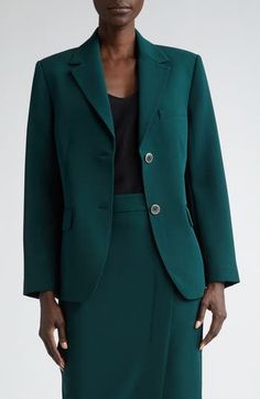 Add a bold jolt of color to your wardrobe with this richly hued blazer impeccably tailored in a single-breasted silhouette of stretch cady. Front button closure Notched lapels Three-button cuffs Chest welt pocket; front flap pockets Lined 95% polyester, 5% elastane Dry clean Imported Designer Clothing Green Blazer With Hidden Buttons For Office, Green Office Blazer With Hidden Button Closure, Green Notch Lapel Blazer For Work, Chic Green Single-button Blazer, Elegant Green Blazer With Button Closure, Chic Green Single Button Blazer, Green Office Blazer With Pressed Crease, Elegant Green Single Button Blazer, Designer Clothing Brands