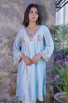 Blue kurta with multicolor resham and beads embroidery in floral motifs. Paired with scallop hem pant. - Aza Fashions Traditional Mirror Work Kurta For Spring, Traditional V-neck Kurta With Dabka Work, Designer Embroidered V-neck Kurta, Designer V-neck Embroidered Kurta, Bohemian Blue Chanderi Kurta, Blue Bohemian Kurta With Dupatta, Multicolor V-neck Kurta For Eid, Bohemian Blue Lawn Suit For Festive Occasions, Blue Bohemian Lawn Suit For Festive Occasion