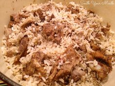 rice and meat are mixed together in a bowl