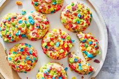 colorful sprinkle cookies on a white plate