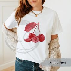 "Cute cherry shirt 90s aesthetic gift, the perfect cozy vintage style Y2K T-Shirt fruit graphic tee present with red cherries and text on front across chest. Design is in a grunge vintage texture of a whole pair of cherry and a sliced one along with textured leaf. Along one stem of the cherry is \"wild like cherries\" bring a bit of coquette feel to the shirt. \"NO VINAYL IN HERE\"  These cozy tees are made from cotton specially spun fibers provide smooth surface, No side seams mean there are no itchy interruptions under the arms. The shoulders have tape for improved durability. Runs true to size, but size up x2 if you'd like a more oversized fit. .: 100% cotton (fiber content may vary for different colors) .: Medium fabric (5.3 oz/yd² (180 g/m .: Classic fit .: Tear-away label All T-shirt Y2k Cherry Print Summer T-shirt, Y2k Style Cherry Print Summer T-shirt, Y2k Style Cherry Print T-shirt For Summer, Y2k T-shirt With Cherry Print, Retro Cherry Print T-shirt For Summer, Y2k Crew Neck T-shirt With Cherry Print, Casual Cherry Print T-shirt, Casual Cherry Short Sleeve Tops, Red T-shirt For Spring