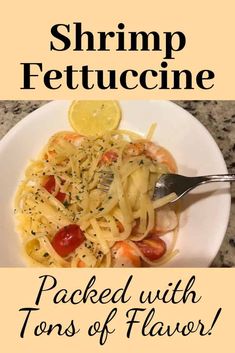 shrimp fettuccine with lemons and tomatoes on a white plate next to the words, shrimp fettuccine packed with tons of flavor