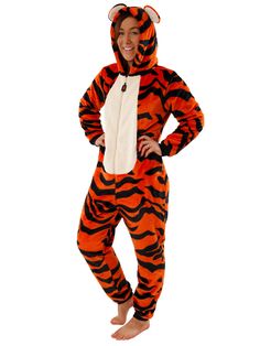 a person in a tiger costume posing for the camera