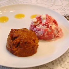 two desserts are sitting on a white plate