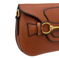 This all fabulous day bag has been a mega. A reduced size of the best selling Blair Crossbody, this luxe little bag packs a huge punch of style and gorgeous bridle leather that is so smooth it has all of us swooning. All solid equestrian hardware, gorgeous topstitching and a stunning contrast suede interior. Perfect for a small wallet, phone and keys. Detach the leather and webbing signature strap and you have an equally gorgeous clutch. Benchmade by our master harness makers, one by one, just f Rectangular Shoulder Bag With Horsebit Detail For Everyday Use, Travel Shoulder Bag With Horsebit Detail, Travel Satchel Shoulder Bag With Horsebit Detail, Rectangular Bags With Horsebit Detail For Everyday Use, Travel Shoulder Bag With Horsebit Detail Satchel, Brown Saddle Bag With Detachable Strap, Classic Brown Shoulder Bag With Horsebit Detail, Brown Rectangular Shoulder Bag With Horsebit Detail, Rectangular Brown Shoulder Bag With Horsebit Detail