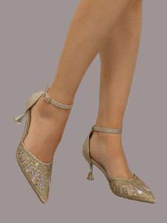 Rich golden hues make this festive shoe an exquisite choice for anniversaries and parties! A mid heel height of 7cm/2.8inch and sparkling glitter upper material comes together with a breathable mesh lining to form the perfect pair.     Size US Ball Girth Foot Length Heel Height CN35 US5.5 8.1 8.9 2.8 CN36 US6 8.2 9.1 2.8 CN37 US6.5 8.4 9.3 2.8 CN38 US7 8.5 9.4 2.8 CN39 US7.5 8.6 9.6 2.8 CN40 US8 8.8 9.8 2.8 CN41 US8.5 8.9 10 2.8 CN42 US9.5 9.1 10.2 2.8 CN43 US10 9.2 10.4 2.8 CN44 US10.5 9.3 10.6 Champagne Sparkling Ankle Strap Heels, Gold Closed Toe Heels With 4-inch Heel, Golden Heels, Open Heel Heels With Gold-tone Hardware For Evening, Metallic Ankle Strap Heels With 4-inch Heel, Gold-tone Open Heel Evening Heels, Festival Shoes, Strap Pumps, Ankle Strap Pumps