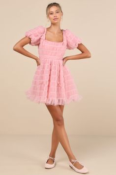 Flirt your way through all the cutest events in the Lulus Utterly Adored Pink Tulle Textured Puff Sleeve Bow Mini Dress! Dreamy tulle boasts a cloud-like textured effect (with contrasting white stitching) as it shapes short puff sleeves with elastic at the cuffs. Square neckline tops a princess-seamed bodice with a single tie at the back and a fitted waist. Skirt has a flaring silhouette that ends at a ruffled mini hem. Darling bow details throughout lend a coquette finish. Hidden zipper/clasp at back. Fit: This garment fits true to size. Length: Mid-thigh. Size medium measures 33" from shoulder to hem. Bust: Great for any cup size. Waist: Fitted - very fitted at natural waist. Hip: Not Fitted - fuller skirt allows room for hips. Undergarments: May be worn with a strapless bra, adhesive br Puff Sleeve Tulle Party Dress, Chic Puffy Party Dress, Fitted Organza Mini Dress With Tulle Skirt, Fitted Mini Dress With Tulle Skirt In Organza, Fitted Tulle Tutu Dress With Short Sleeves, Balletcore Dress With Square Neck For Party, Spring Party Tutu Dress With Short Sleeves, Fitted Tulle Tutu Dress For Garden Party, Fitted Organza Mini Dress For Garden Party